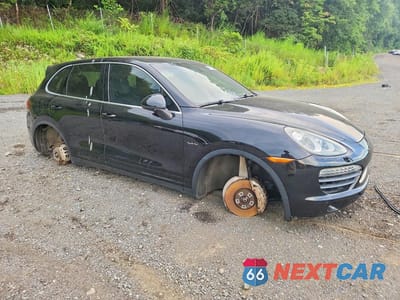 Czwarte zdjęcie samochodu z boku: 2012 PORSCHE CAYENNE S HYBRID VIN:WP1AE2A26CLA93688 - miniatura