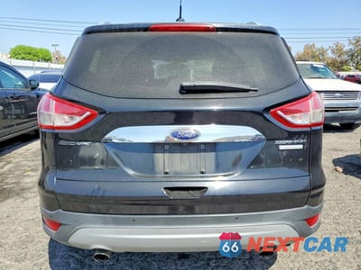 Zdjęcie 6 z 13 samochodu: 2016 FORD ESCAPE TITANIUM VIN:1FMCU0JX0GUC43917 - miniatura