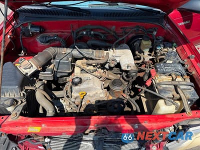 Zdjęcie 7 z 10 samochodu: 2000 TOYOTA TACOMA BASE VIN:4TANL42N9YZ672106 - miniatura