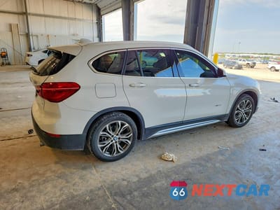 Trzecie zdjęcie samochodu z tyłu: 2017 BMW X1 VIN:WBXHT3Z35H4A53635 - miniatura