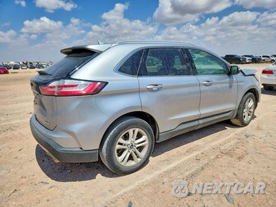 Trzecie zdjęcie samochodu z tyłu: 2020 FORD EDGE SEL VIN:2FMPK3J92LBA74364 - miniatura