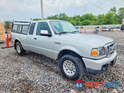 Czwarte zdjęcie samochodu z boku: 2011 FORD RANGER SUPER CAB VIN:1FTLR4FE7BPA56296 - miniatura