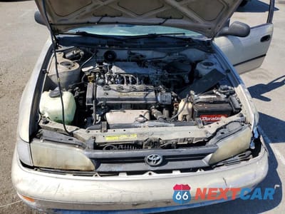 Zdjęcie 11 z 12 samochodu: 1994 TOYOTA COROLLA DX VIN:1NXAE09B5RZ219032 - miniatura