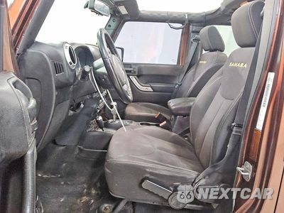 Zdjęcie 7 z 13 samochodu: 2013 JEEP WRANGLER UNLIMITED SAHARA VIN:1C4BJWEG0DL698502 - miniatura