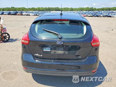 Zdjęcie 6 z 12 samochodu: 2017 FORD FOCUS SEL VIN:1FADP3M21HL311401 - miniatura