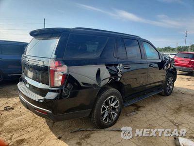 Trzecie zdjęcie samochodu z tyłu: 2021 CHEVROLET TAHOE K1500 Z71 VIN:1GNSKPKD9MR465445 - miniatura