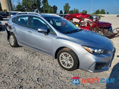 Czwarte zdjęcie samochodu z boku: 2018 SUBARU IMPREZA PREMIUM PLUS VIN:4S3GTAD60J3717993 - miniatura