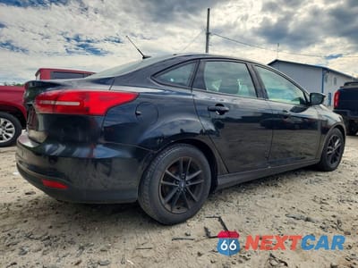 Trzecie zdjęcie samochodu z tyłu: 2015 FORD FOCUS SE VIN:1FADP3F25FL365083 - miniatura