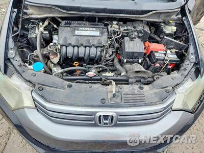 Zdjęcie 11 z 12 samochodu: 2010 HONDA INSIGHT EX VIN:JHMZE2H73AS004120 - miniatura