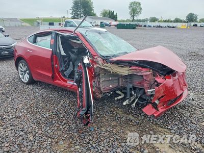 Czwarte zdjęcie samochodu z boku: 2019 TESLA MODEL 3 VIN:5YJ3E1EA2KF417310 - miniatura