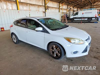 Czwarte zdjęcie samochodu z boku: 2013 FORD FOCUS SE VIN:1FADP3K22DL184610 - miniatura
