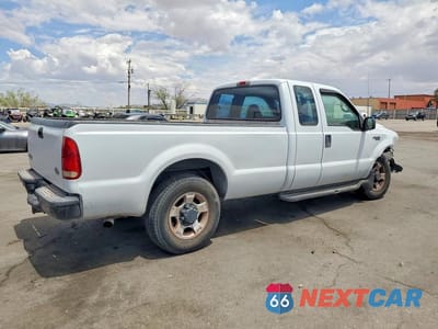 Trzecie zdjęcie samochodu z tyłu: 1999 FORD F250 SUPER DUTY VIN:1FTNX20L2XEA55733 - miniatura