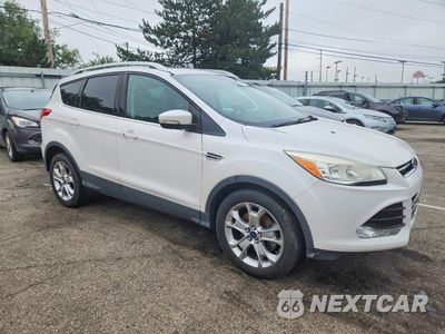 Czwarte zdjęcie samochodu z boku: 2015 FORD ESCAPE TITANIUM VIN:1FMCU9JX8FUA05350 - miniatura