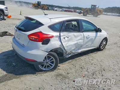 Trzecie zdjęcie samochodu z tyłu: 2016 FORD FOCUS SE VIN:1FADP3K24GL261353 - miniatura