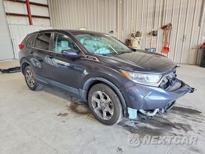 Czwarte zdjęcie samochodu z boku: 2019 HONDA CR-V EXL VIN:2HKRW2H8XKH627970 - miniatura