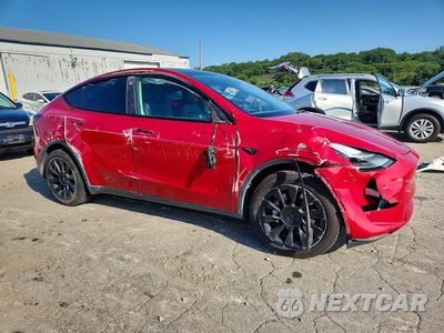 Czwarte zdjęcie samochodu z boku: 2022 TESLA MODEL Y VIN:7SAYGDEE8NF325940 - miniatura