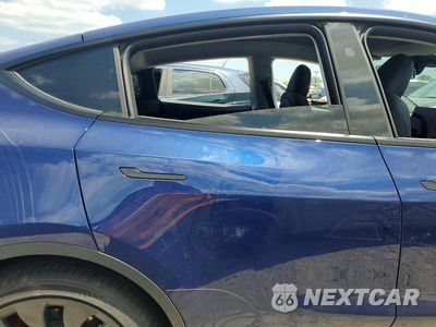 Zdjęcie 11 z 14 samochodu: 2023 TESLA MODEL Y VIN:7SAYGDEF7PF866070 - miniatura