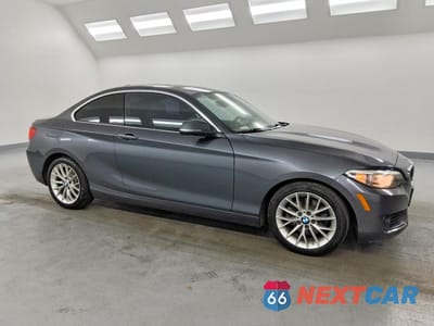 Czwarte zdjęcie samochodu z boku: 2014 BMW 228 I VIN:WBA1F5C51EVV98985 - miniatura