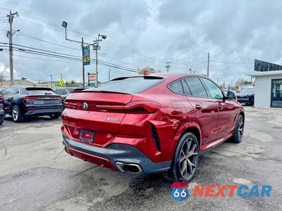 Czwarte zdjęcie samochodu z boku: 2021 BMW X6 M50I VIN:5UXCY8C09M9E51267 - miniatura