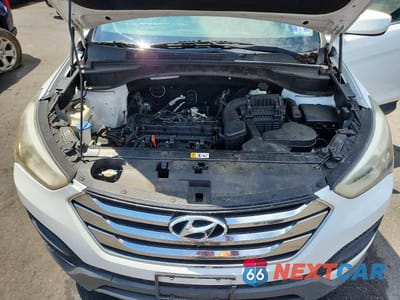 Zdjęcie 11 z 12 samochodu: 2013 HYUNDAI SANTA FE SPORT 2.4L VIN:5XYZT3LB4DG046881 - miniatura