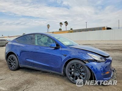 Czwarte zdjęcie samochodu z boku: 2021 TESLA MODEL Y VIN:5YJYGDEEXMF241520 - miniatura