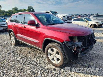 Czwarte zdjęcie samochodu z boku: 2012 JEEP GRAND CHEROKEE LAREDO VIN:1C4RJEAG1CC157651 - miniatura