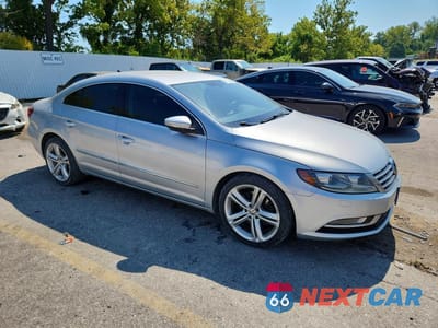 Czwarte zdjęcie samochodu z boku: 2013 VOLKSWAGEN CC SPORT VIN:WVWBN7AN8DE539052 - miniatura