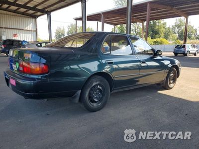 Piąte zdjęcie samochodu w środku: 1995 TOYOTA CAMRY LE VIN:JT2SK12E7S0287186 - miniatura