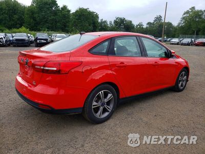 Trzecie zdjęcie samochodu z tyłu: 2017 FORD FOCUS SE VIN:1FADP3FE9HL322881 - miniatura