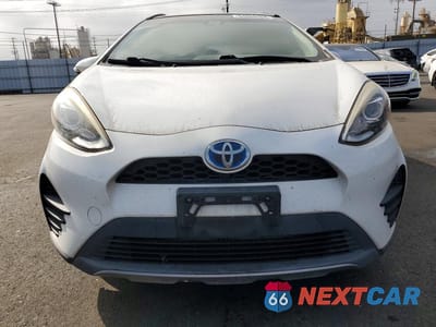 Piąte zdjęcie samochodu w środku: 2018 TOYOTA PRIUS C TWO VIN:JTDKDTB37J1617283 - miniatura