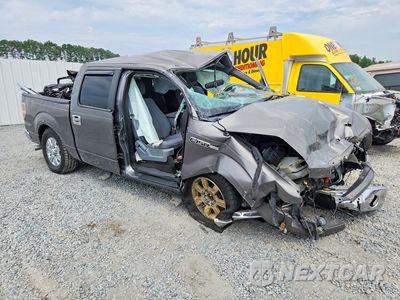 Czwarte zdjęcie samochodu z boku: 2011 FORD F150 SUPERCREW VIN:1FTFW1CT7BFC83694 - miniatura