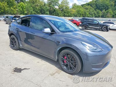 Czwarte zdjęcie samochodu z boku: 2021 TESLA MODEL Y VIN:5YJYGDEE9MF085471 - miniatura