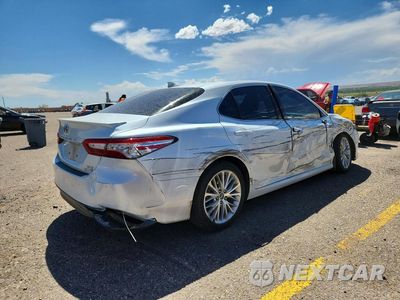 Trzecie zdjęcie samochodu z tyłu: 2018 TOYOTA CAMRY HYBRID XLE VIN:4T1B21HK7JU509152 - miniatura