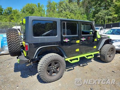 Trzecie zdjęcie samochodu z tyłu: 2018 JEEP WRANGLER UNLIMITED SPORT VIN:1C4BJWDG9JL818827 - miniatura