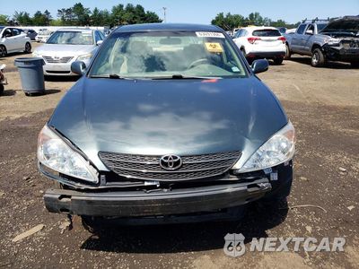 Piąte zdjęcie samochodu w środku: 2004 TOYOTA CAMRY LE VIN:4T1BE30K64U329079 - miniatura