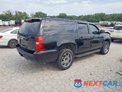 Trzecie zdjęcie samochodu z tyłu: 2011 CHEVROLET SUBURBAN K1500 LS VIN:1GNSKHE32BR123227 - miniatura