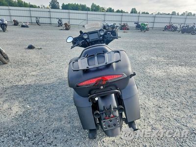 Czwarte zdjęcie samochodu z boku: 2023 INDIAN MOTORCYCLE CO. ROADMASTER DARK HORSE VIN:56KTKDBB7P3421620 - miniatura