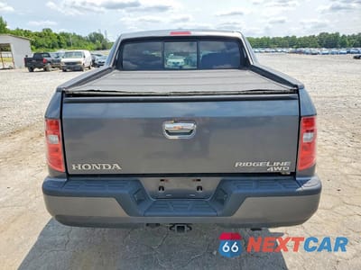 Zdjęcie 6 z 12 samochodu: 2011 HONDA RIDGELINE RTL VIN:5FPYK1F51BB009324 - miniatura
