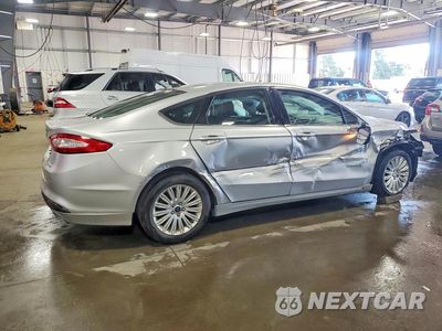 Trzecie zdjęcie samochodu z tyłu: 2016 FORD FUSION SE HYBRID VIN:3FA6P0LU5GR385558 - miniatura