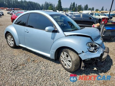 Czwarte zdjęcie samochodu z boku: 2009 VOLKSWAGEN NEW BEETLE S VIN:3VWRG31C09M515777 - miniatura