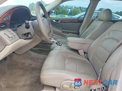 Zdjęcie 7 z 12 samochodu: 2004 CADILLAC DEVILLE VIN:1G6KD54Y94U148921 - miniatura