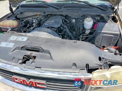 Zdjęcie 12 z 13 samochodu: 2003 GMC YUKON XL C1500 VIN:1GKEC16T13J145569 - miniatura
