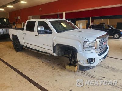 Czwarte zdjęcie samochodu z boku: 2015 GMC SIERRA K3500 DENALI VIN:1GT424E83FF525478 - miniatura