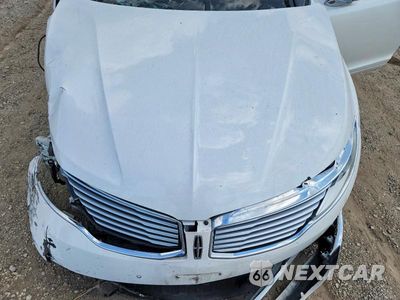 Zdjęcie 11 z 12 samochodu: 2014 LINCOLN MKZ HYBRID VIN:3LN6L2LU2ER825438 - miniatura