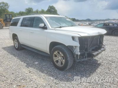 Czwarte zdjęcie samochodu z boku: 2018 CHEVROLET SUBURBAN C1500 LT VIN:1GNSCHKC5JR101402 - miniatura