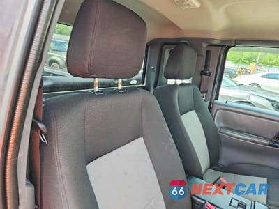 Zdjęcie 10 z 12 samochodu: 2010 FORD RANGER SUPER CAB VIN:1FTLR4FEXAPA03817 - miniatura