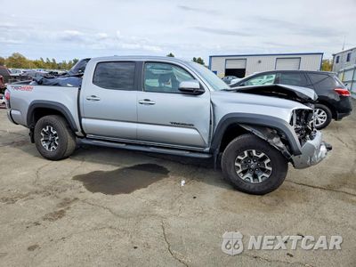 Czwarte zdjęcie samochodu z boku: 2023 TOYOTA TACOMA TRD OFF-ROAD VIN:3TMCZ5AN5PM654302 - miniatura