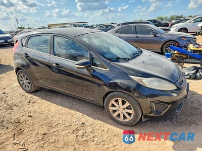 Czwarte zdjęcie samochodu z boku: 2013 FORD FIESTA SE VIN:3FADP4EJXDM158781 - miniatura