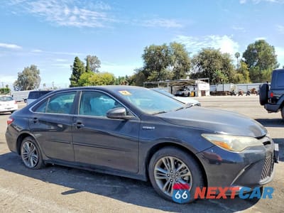 Czwarte zdjęcie samochodu z boku: 2017 TOYOTA CAMRY HYBRID SE VIN:4T1BD1FK8HU201687 - miniatura