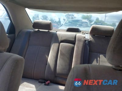 Zdjęcie 10 z 13 samochodu: 1999 TOYOTA CAMRY LE VIN:JT2BG22K7X0294174 - miniatura